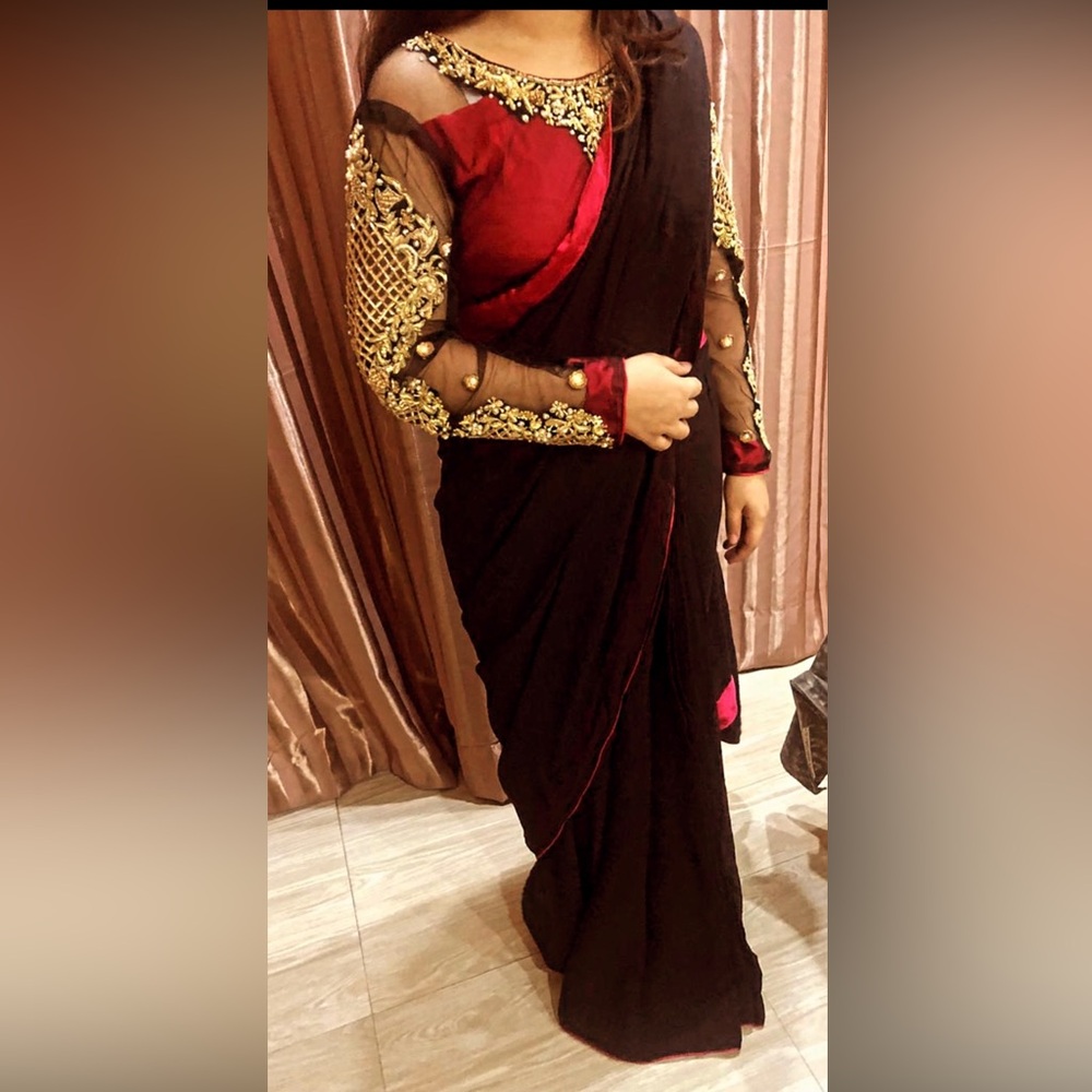 Elegant Black and Red Embellished Saree
